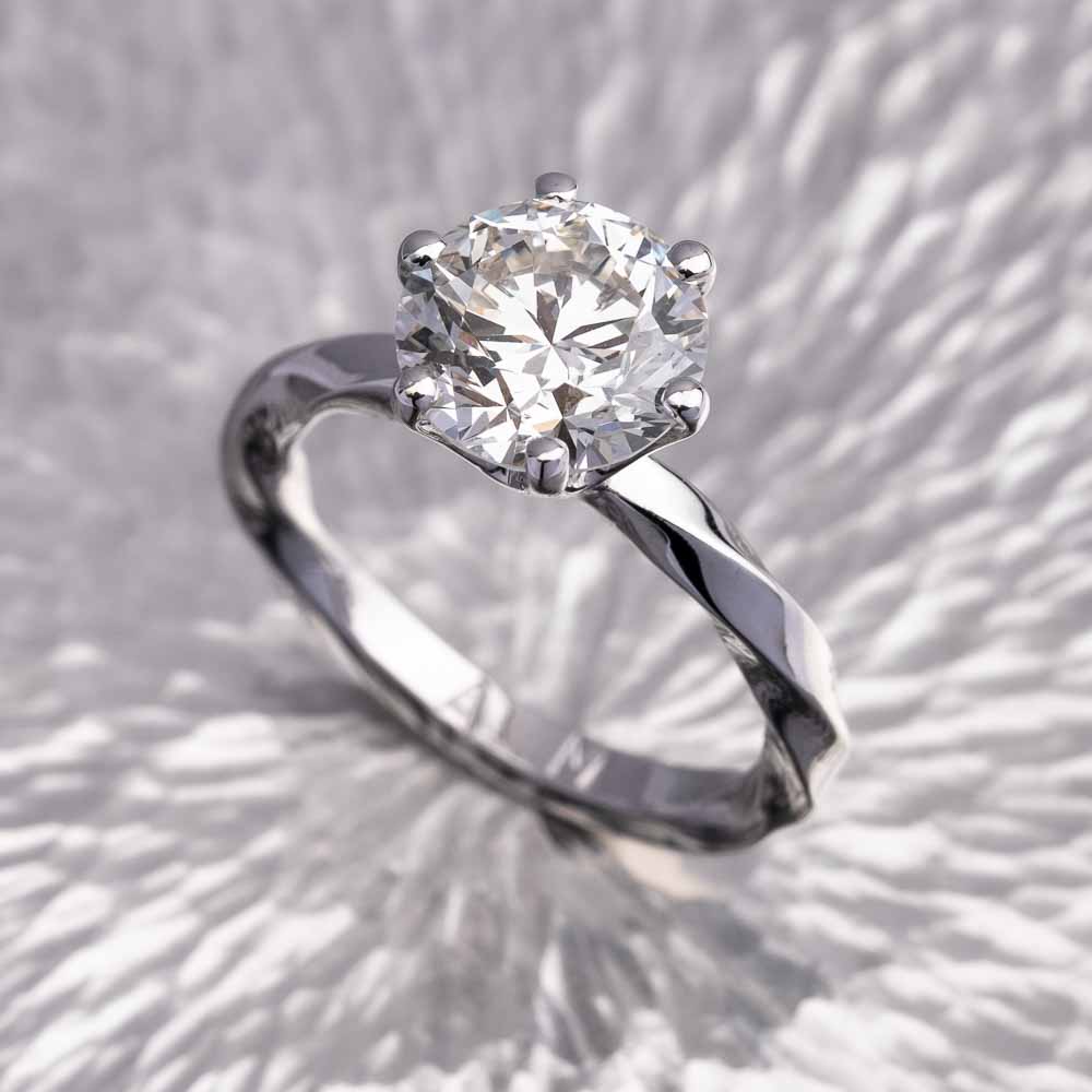 Twisted silver diamond engagement ring
